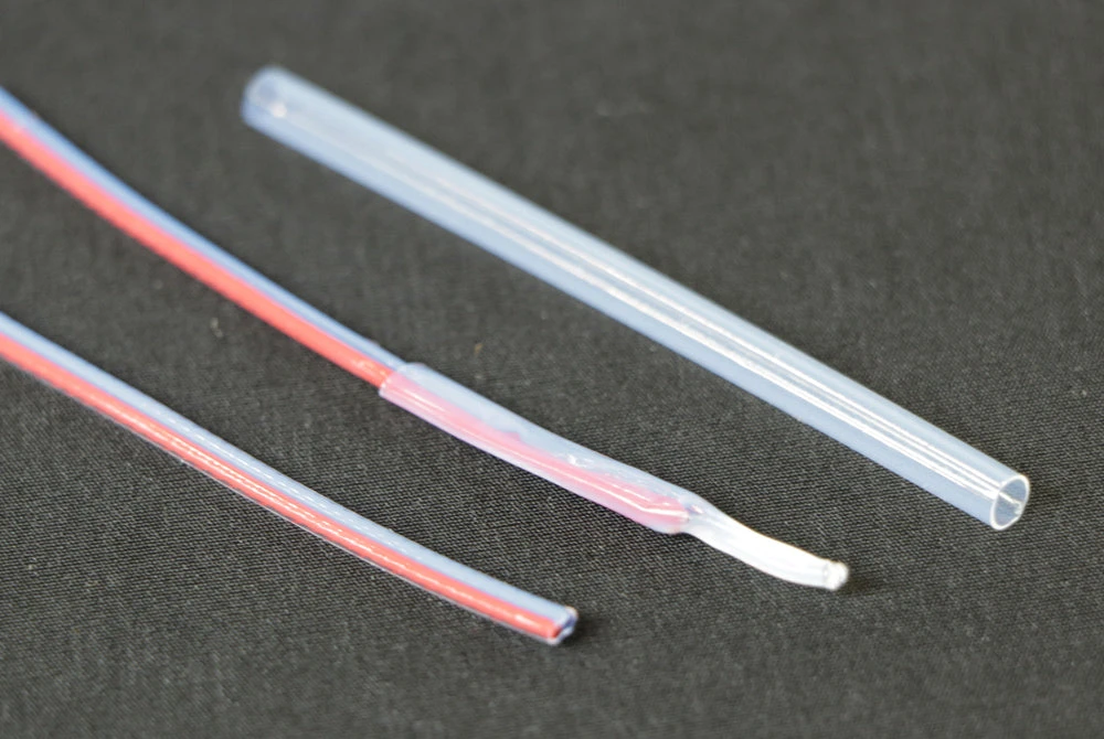 THFE4.141010 Versilon™ By Saint Gobain | 0.114" ID Recovered X 0.141" ID Expanded X .010" Wall | FEP 1.3X Heat Shrink Tubing | 4' Package Length 1 THFE4.141010 Versilon™ By Saint Gobain | 0.114" ID Recovered X 0.141" ID Expanded X .010" Wall | FEP 1.3X Heat Shrink Tubing | 4' Package Length